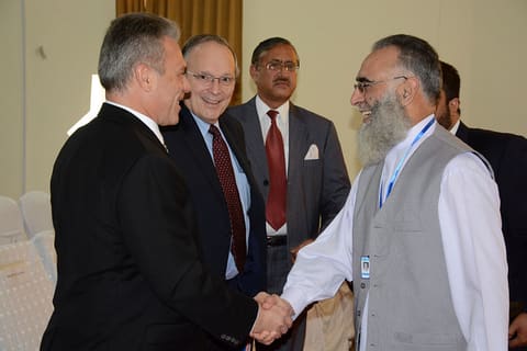 Prof. Dr. Syed Dilnawaz Ahmed Gardezi, Vice Chancellor, University of AJK greets  Director Education USAID, Chief of Party, Pakistan Reading Project and Khurshid Ahmad Ch, Secretary Elementary and Secondary Education to the Scholarships Ceremony AJK.