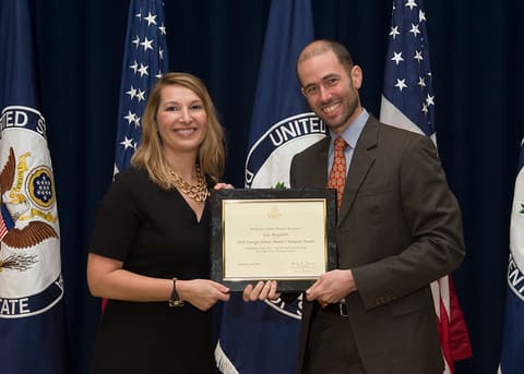 Mentor Guy Margalith Receives The 2016 Foreign Service Mentor Champion Award and Poses with Deputy Secretary Heather Higginbottom
