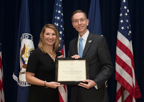 Mentor Bruce Cole Receives The 2016 Civil Service Mentor Champion Award and Poses with Deputy Secretary Heather Higginbottom