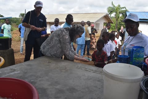 CDA sharing hot meal with kids provided by Mary's Meal through USAID Funding5
