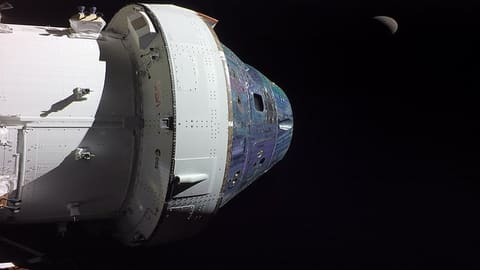 Flight Day 8: Orion and Crescent Moon
