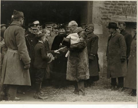 President and Mrs. Wilson Receiving Flowers from French Children