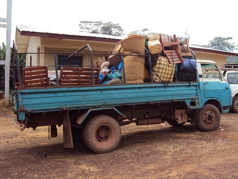 Refugees fleeing with their belongings