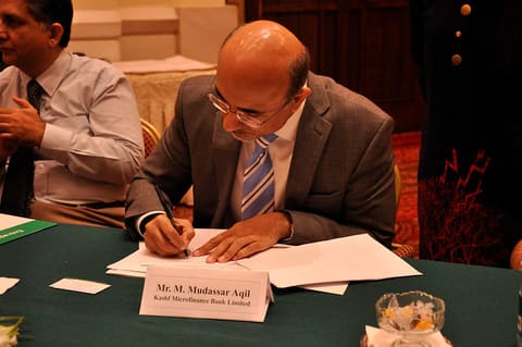 Mr. M. Mudassar Aqil (Chief Executive Officer KASHF Microfinance bank Ltd.) signing the MOU
