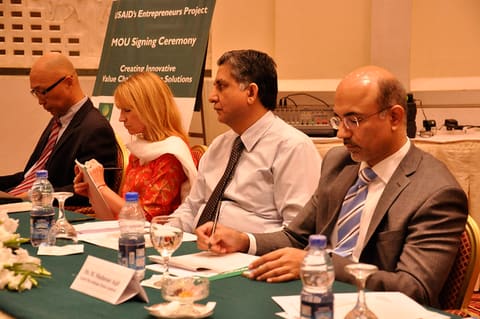 Mr. Daniel Lee (DCOP USAID's Entrepreneurs Project), Ms. Susan Slomback (COP USAID's Entrepreneurs Project), Mr. Muhammad Naguib Saigal (CFO, Shakarganj Foods), Mr. M. Mudassar Aqil (Chief Executive Officer KASHF Microfinance bank Ltd.)