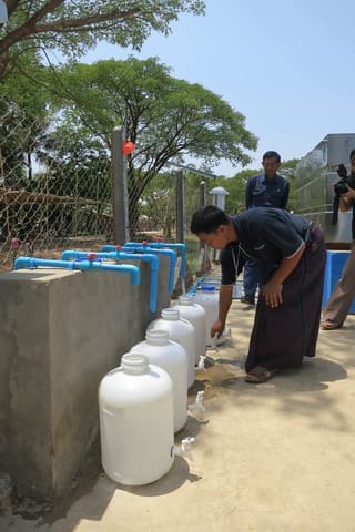 Filling jugs with potable water