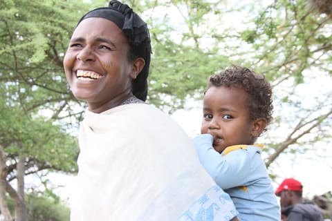 A Mother and Child Seen Outside a Health Post in SNNP Region